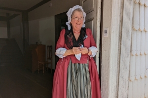 Shippen Manor docent, Cat, in 18th century period clothing